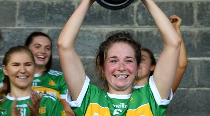 Kilmihil captain Ellie O’Gorman lifts the 2019 Clare SFC title. Photo: Gerry O’Neill.