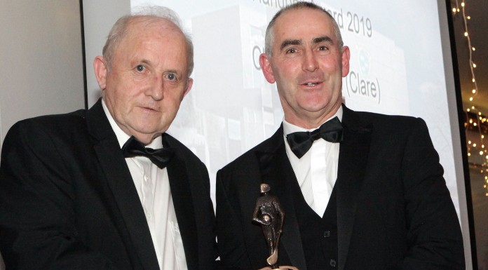 Christy Philpott receives Munster GAA Award from Munster GAA Tresurer, Pearse Murphy