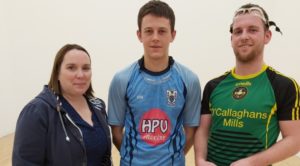 Junior B Finalists: Paula Carr Whelan, Clare Handball Secretary presents county medals to Glenn Murray (centre) and Kevin O'Callaghan (right). 