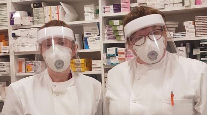 Bridget Griffey (left) and Isobel Barnes, the Burren Pharmacy, Lisdoonvarna, Co Clare, wearing visors designed, produced and delivered by GMIT engineers led by Dr Brian Souza, Dept of Mechanical and Industrial Engineering.